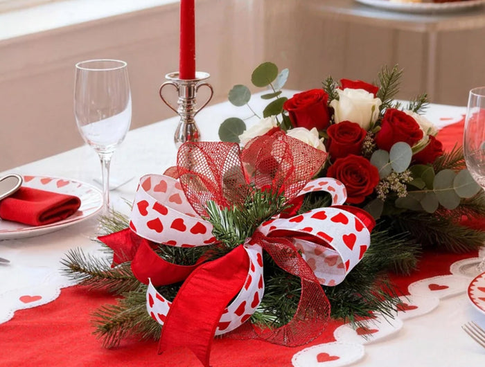 Christmas gifts with plaid wrapping, red satin bows, nutcracker-printed ribbon, plus pinecones and greens—full of festive charm.