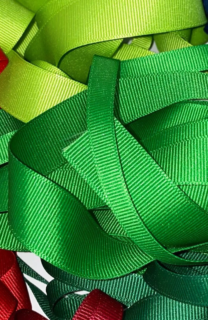 Vibrant grosgrain ribbons in red, green, blue and more with distinct ribbed texture. Durable for gift wrapping, crafts, and decorative projects 丨 LaRibbons and Crafts