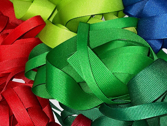 Vibrant grosgrain ribbons in red, green, blue and more with distinct ribbed texture. Durable for gift wrapping, crafts, and decorative projects 丨 LaRibbons and Crafts