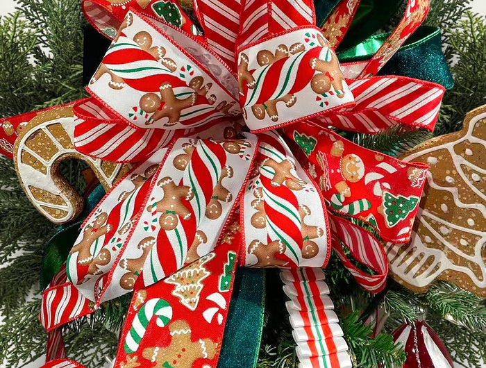 Christmas tree topper with gingerbread & candy cane wired ribbon bow. Holds shape well, perfect for holiday decor and wreaths, adding festive flair. | LaRibbons and Crafts