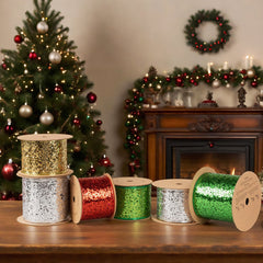 LaRibbons and Crafts Sequined Wired Ribbon in shimmering gold and silver, with dense sequin pattern, spooled on kraft paper reels, showcasing glamorous texture and sparkling design.