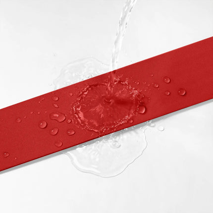 Waterproof red floral satin ribbon with water splash demonstrating water resistant fabric surface