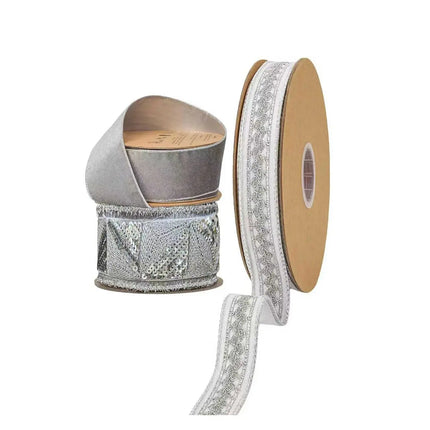 Three spools of premium silver Christmas ribbons: sparkling sequined, soft velvet, and delicate lace-patterned, boasting intricate textures and eye-catching designs.