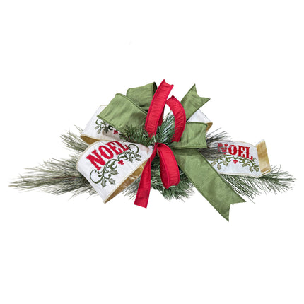 A Christmas decoration features green pine adorned with festive ribbons: red , green, and white with red "NOEL" embroidery.