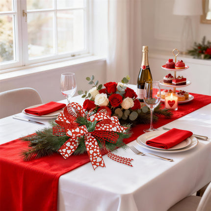 Valentine dining table: red ribbon (white hearts) decor, roses, champagne & dessert setup