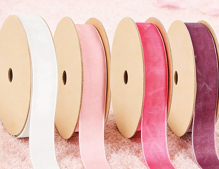 Non-Wired Velvet Ribbon spools (white, light pink, hot pink)—soft texture, romantic hues for Valentine gift wrapping.
