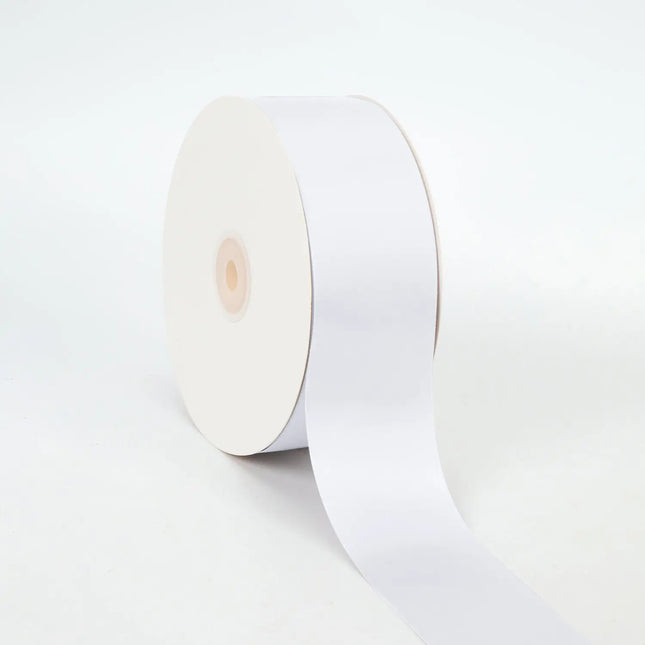 Spool of white double-face satin ribbon smooth sheen for gift wraps