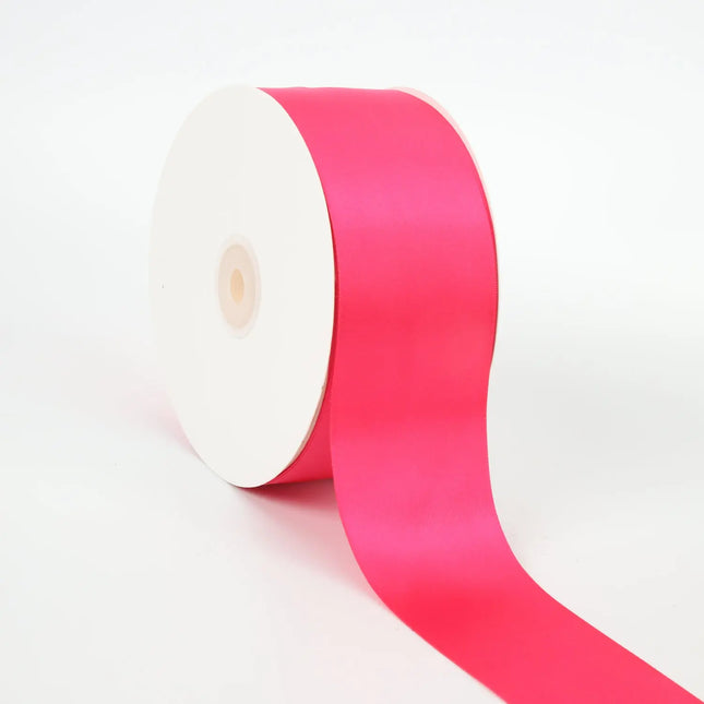 Spool of Shocking Pink double-face satin ribbon smooth sheen for gift wraps