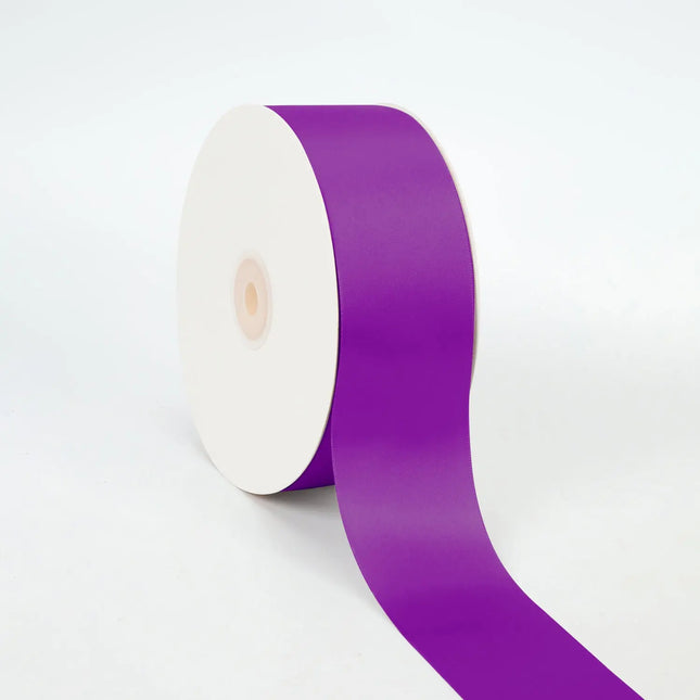 Spool of plum double-face satin ribbon smooth sheen for gift wraps