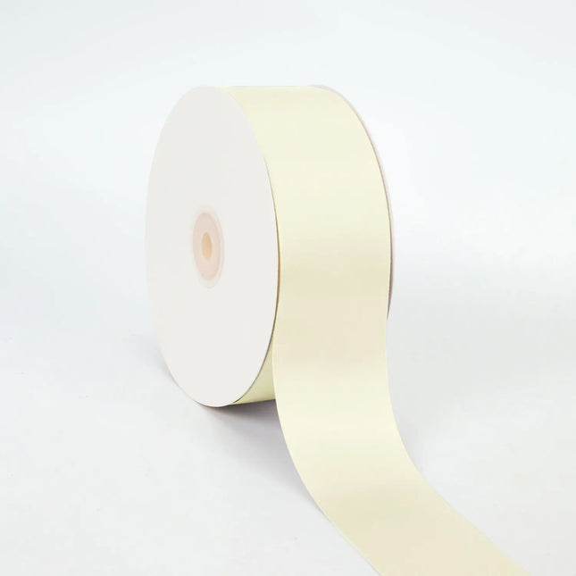 Spool of ivory double-face satin ribbon smooth sheen for gift wraps