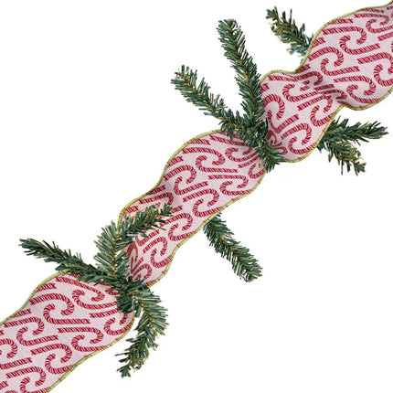A Christmas decoration made of green artificial pine garland and pink ribbon with red candy cane designs, ideal for holiday adornment.