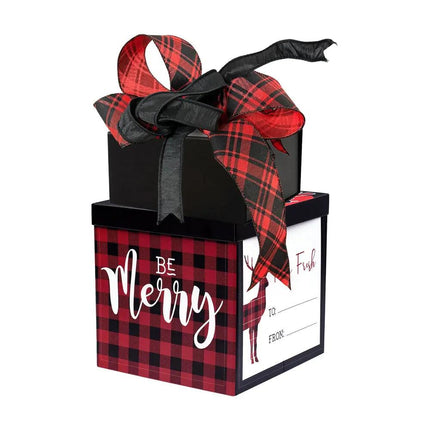 Bow of red-black plaid and black ribbons decorating black box and red-black plaid gift box.