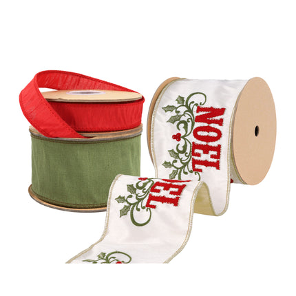Three spools of Christmas ribbons: red , white with red "NOEL" and holly embroidery, and green.
