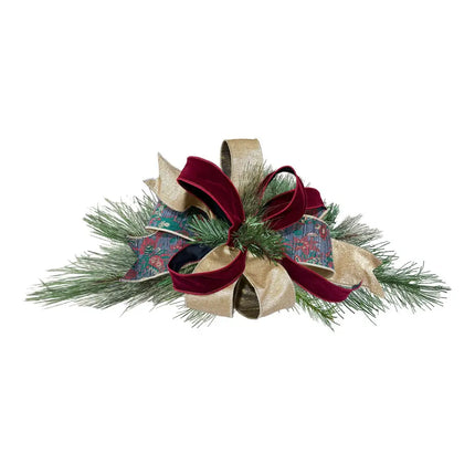Christmas centerpiece with burgundy velvet, gold, paisley ribbons & green pine—exuding luxurious holiday charm.