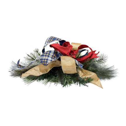 Festive Christmas decor has red, gold metallic, and blue plaid ribbons with pine branches.