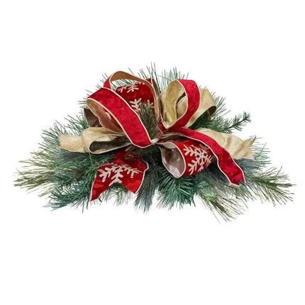 Christmas decor with green pine branches and a bow made of red-gold snowflake & textured ribbons, adding a vibrant festive charm to your holiday space.