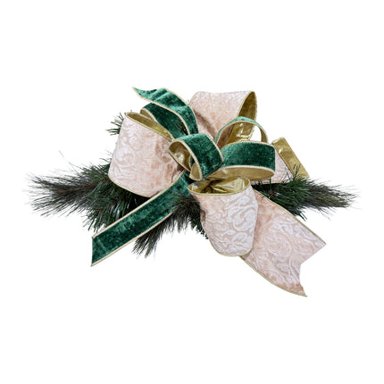 Christmas bow: dark green velvet & beige pattern ribbons on pine. Elegant rich textures.