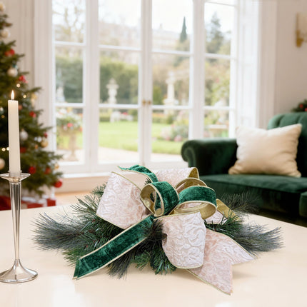  Living room Christmas decor: pine-bow with ivory damask & green velvet, gold-trimmed, by tree.