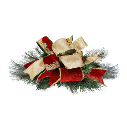 Christmas ribbon arrangement – Red, gold ribbons on green pine, ornate gem & lace details.