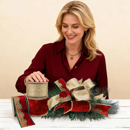 Woman with Christmas ribbon set – Red/gold ribbons, gem-embellished lace, pine arrangement.