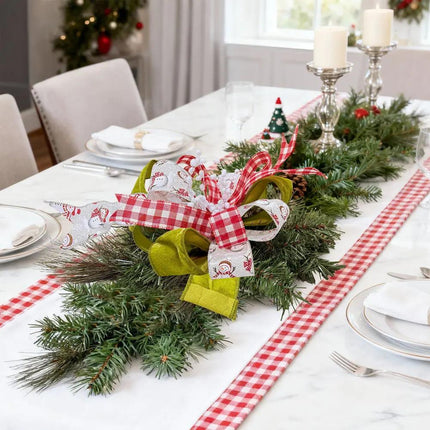 Elegant Christmas Table Decor with Gingham, Snowman, Velvet Ribbons on Pine Branches.