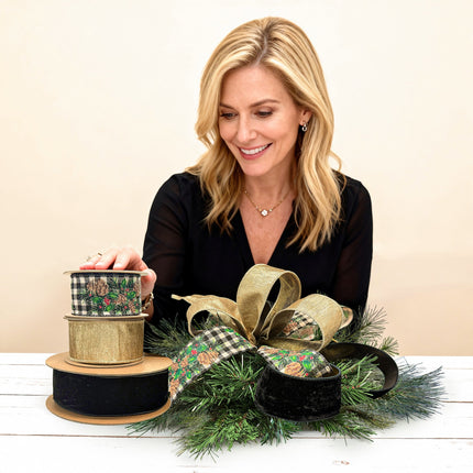 Lady with black velvet, gold, & plaid pinecone ribbons + festive ribbon arrangement.