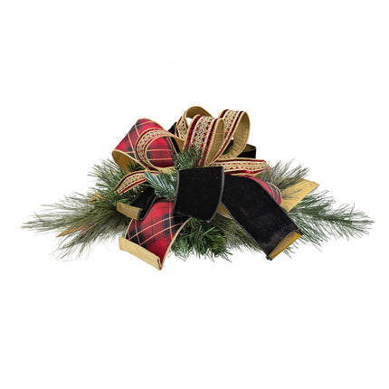 Festive bow (black velvet, red plaid ribbons) + pine sprigs – elegant holiday decor.