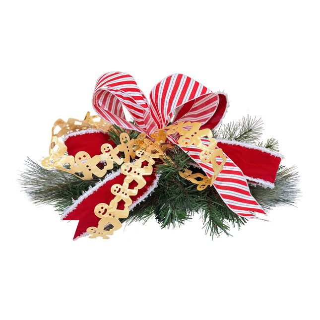 Christmas decor featuring green pine foliage, Candy Cane ribbon, red velvet accents, and gold gingerbread man cutouts.