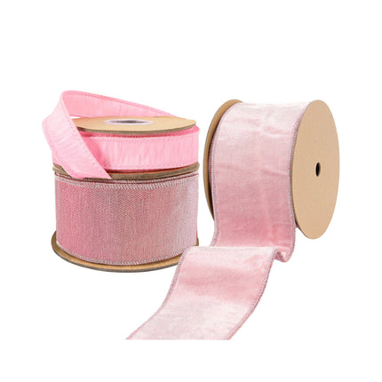 Three rolls of pink ribbons in satin, velvet, and glitter textures, perfect for crafting and festive decorating.