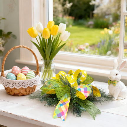 Easter window decor with ribbon bow, eggs, tulips, and bunny figurine.