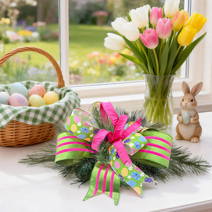 Easter window decor with ribbon bow, eggs, tulips, and bunny figurine.