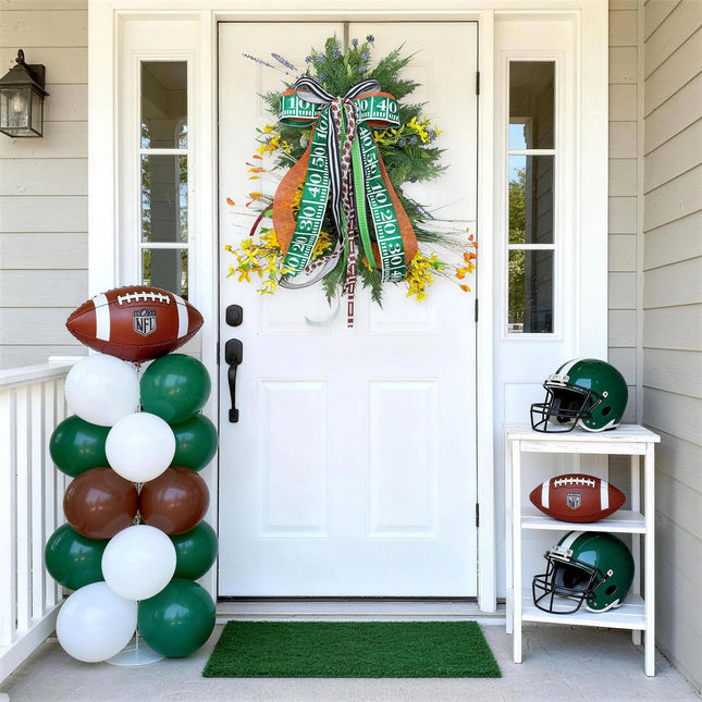 Football-themed front door wreath with football field, football print, and laces grosgrain ribbon bow, paired with game day balloons and decor.