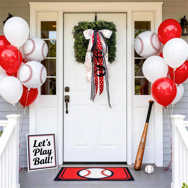 Baseball-themed front door decor with a baseball-print wired ribbon bow on a green wreath