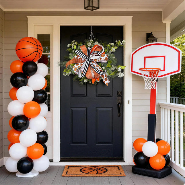 Basketball-themed front door wreath with a wired ribbon bow (glitter basketball, court print, and striped ribbons) for game day decor.