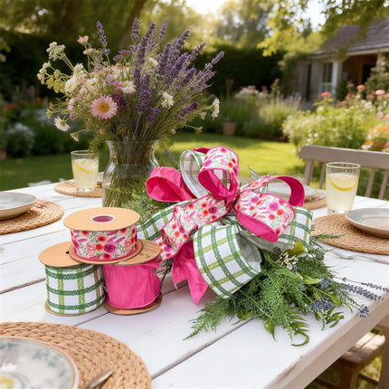 Spring floral ribbon bundle with green grid and hot pink dupioni ribbons, styled as a bow for garden party decor and gift wrapping.