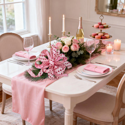 Valentine table setup: pink heart/XO ribbon decor with flowers & pastries