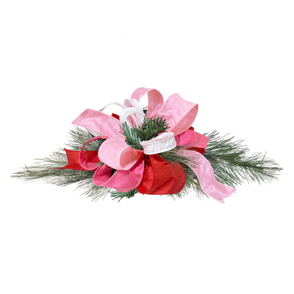Valentine ribbon decor: pink/red/white ribbons arranged on pine foliage