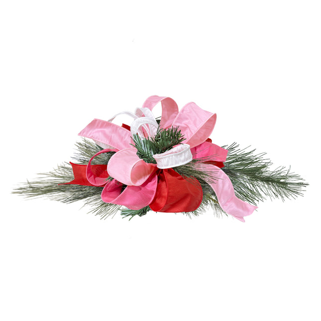 Valentine ribbon decor: pink/red/white ribbons arranged on pine foliage