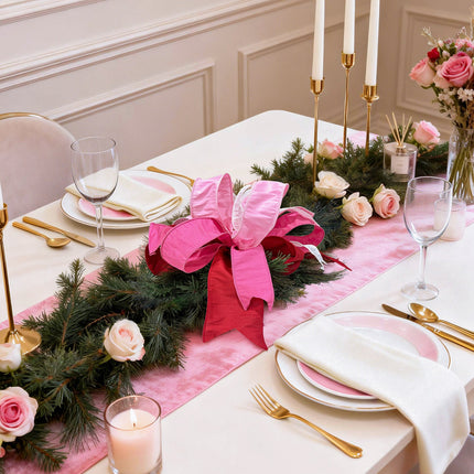 Valentine dining table setup: ribbon decor with flowers, gold utensils