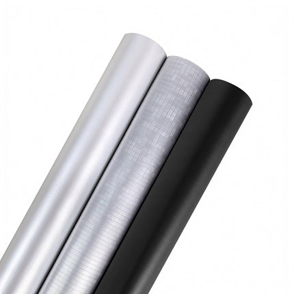 Metallic silver, silver textured & black wrapping paper rolls – 30”x10’ for upscale gifting.