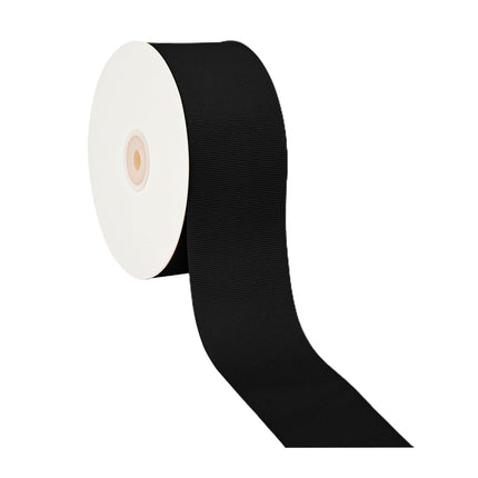 Black textured grosgrain ribbon on spool, partially unrolled