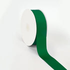 Spool of Forest grosgrain ribbon, unrolled to display its textured weave.