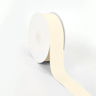 Spool of ivory grosgrain ribbon, unrolled to display its textured weave.