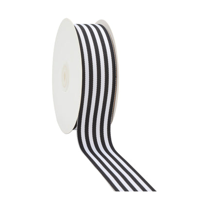Black & white vertical stripe grosgrain ribbon on spool, partially unrolled