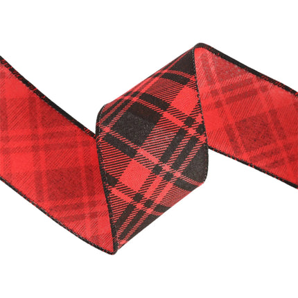Red and black plaid ribbon with folded detail, showing front and back patterns, textured fabric.