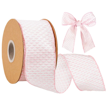 Pink and white woven wired ribbon with textured pattern, spool and bow, for gift wrapping