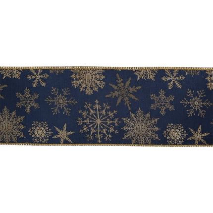 Close-up of 4" wired jacquard ribbon, navy blue with detailed gold snowflakes, highlighting exquisite jacquard work.
