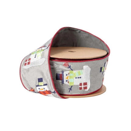 A spool of gray ribbon features colorful embroidered snowmen and red edge stitching, perfect for Christmas crafting.