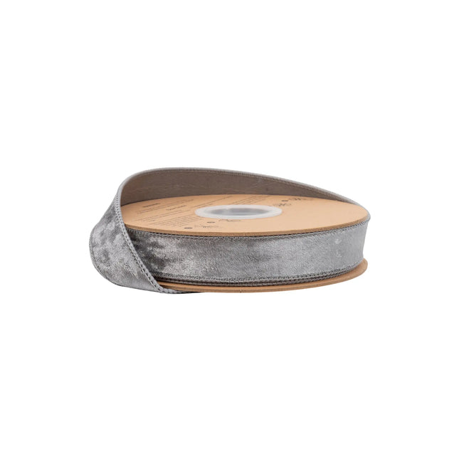 1" wired heritage velvet ribbon in shimmering silver, ideal for elegant gift wrapping and holiday decor accents.