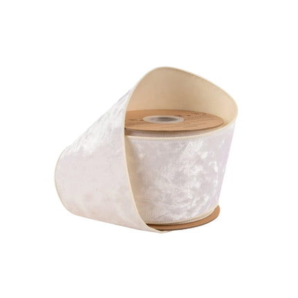 4" wired heritage velvet ribbon in soft ivory, ideal for elegant gift wrapping and timeless decor accents.
